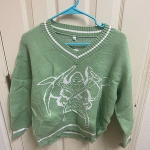green knit sweater